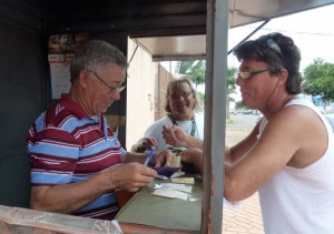 Gil buying a local lottery 