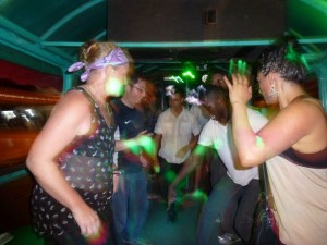 Naomi & Nam dancing on the bus