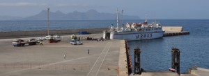 Boat at Santo Antao pier; St Vicente (back)