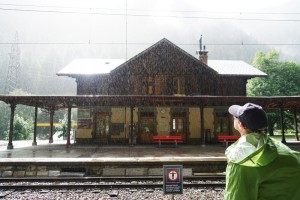 Day 4-  Francis looking at sunshine through the rain at train station